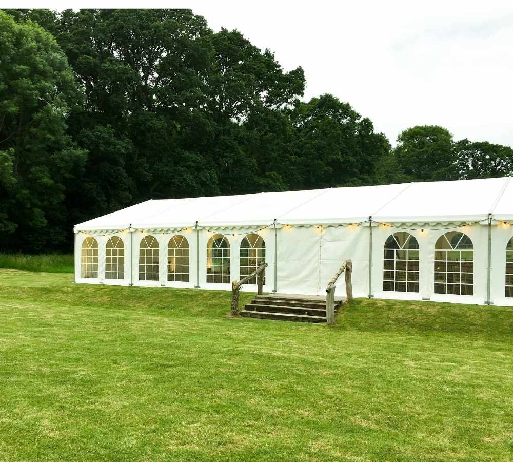 Marquee surrounded by festoon lights.